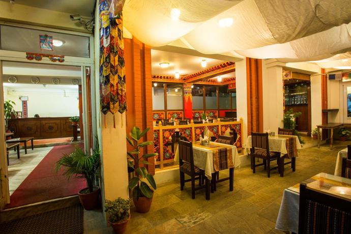 Imagen del bar/restaurante del Hotel Yambu. Foto 4