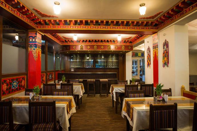 Imagen del bar/restaurante del Hotel Yambu. Foto 5