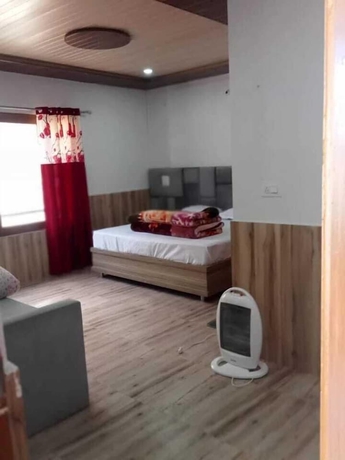 Imagen de la habitación del Hotel Yamuna Palace. Foto 3