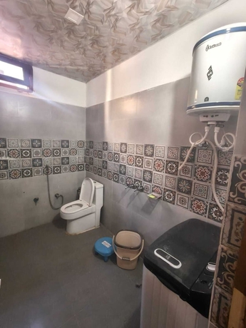 Imagen de la habitación del Hotel Yamuna Palace. Foto 14