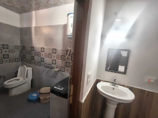 Imagen de la habitación del Hotel Yamuna Palace. Foto 16