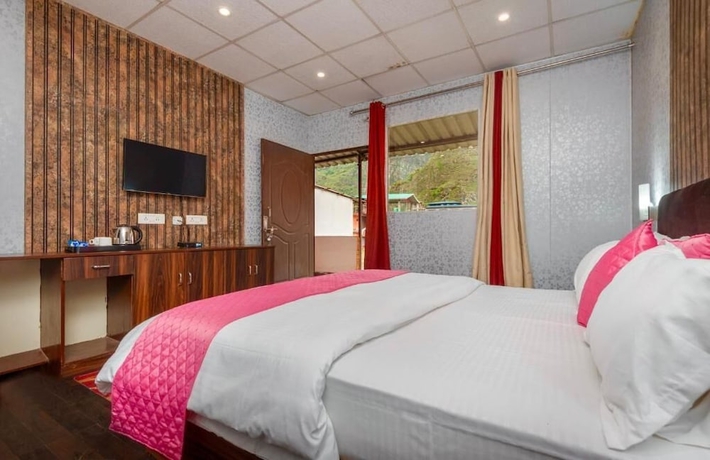 Imagen de la habitación del Hotel Yamunotri Cottages. Foto 5