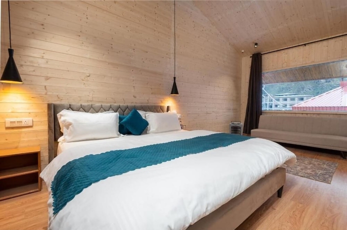 Imagen de la habitación del Hotel Yamunotri Cottages. Foto 7