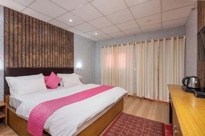Imagen de la habitación del Hotel Yamunotri Cottages. Foto 9