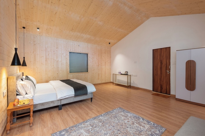 Imagen de la habitación del Hotel Yamunotri Cottages. Foto 11