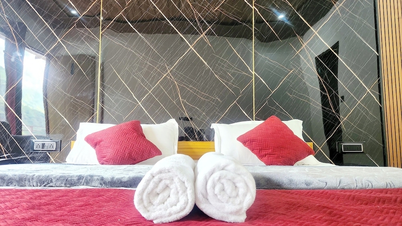 Imagen de la habitación del Hotel Yamunotri Heli Resort. Foto 2