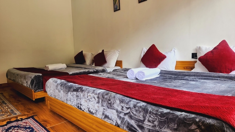 Imagen de la habitación del Hotel Yamunotri Heli Resort. Foto 3