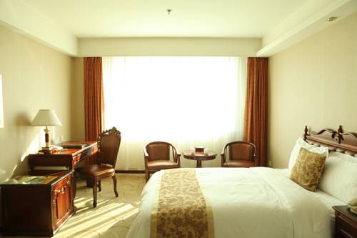 Imagen de la habitación del Hotel Yanbian International. Foto 7