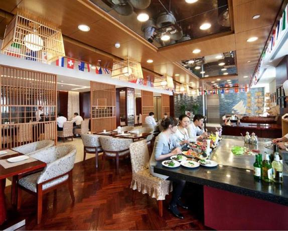 Imagen del bar/restaurante del Hotel Yancheng Shuicheng Hotel. Foto 8