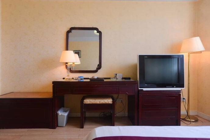 Imagen de la habitación del Hotel Yangcheng. Foto 3