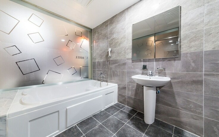 Imagen de la habitación del Hotel Yangju K Plus Hotel. Foto 31