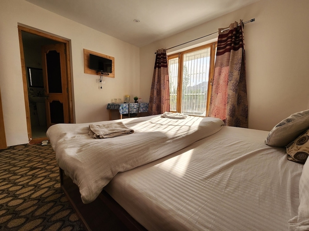 Imagen de la habitación del Hotel Yanglha Guest House. Foto 4