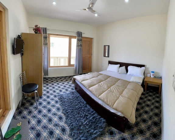 Imagen de la habitación del Hotel Yanglha Guest House. Foto 6
