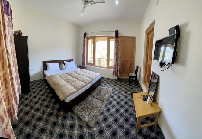 Imagen de la habitación del Hotel Yanglha Guest House. Foto 7