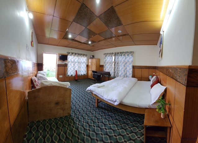 Imagen de la habitación del Hotel Yanglha Guest House. Foto 9