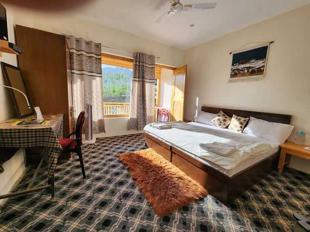 Imagen de la habitación del Hotel Yanglha Guest House. Foto 11