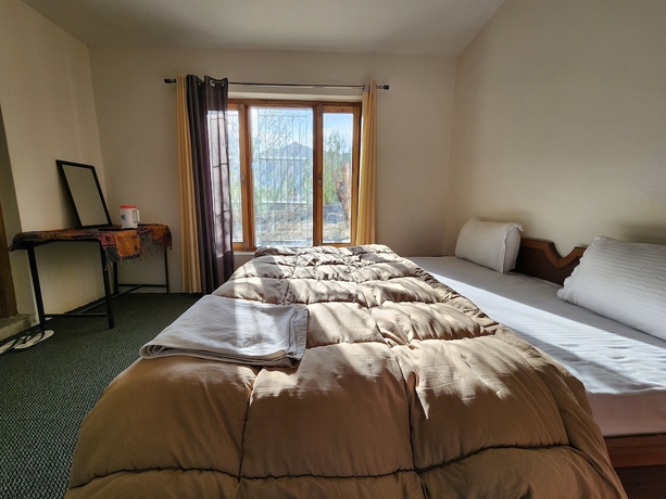 Imagen de la habitación del Hotel Yanglha Guest House. Foto 14