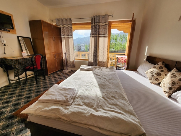 Imagen de la habitación del Hotel Yanglha Guest House. Foto 16