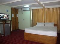 Imagen de la habitación del Hotel Yangon Urban. Foto 1