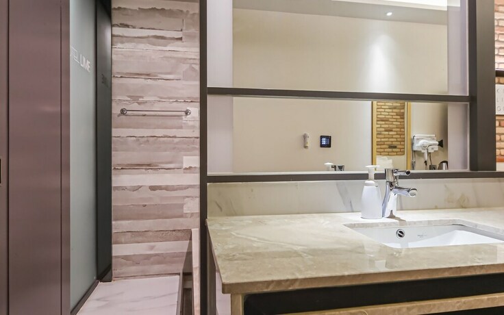 Imagen de la habitación del Hotel Yangsan Bukbudong Lime. Foto 14