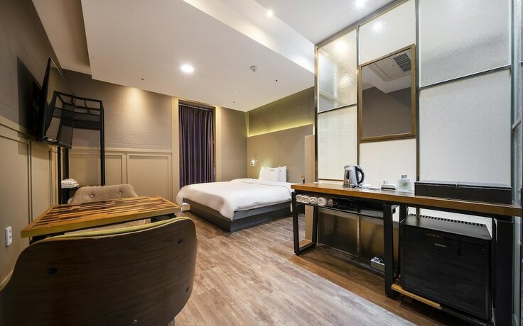 Imagen de la habitación del Hotel Yangsan Mulgeum 369. Foto 17