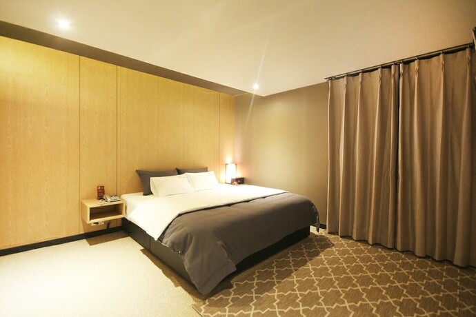 Imagen de la habitación del Hotel Yangsan Mulgeum Bliss. Foto 19