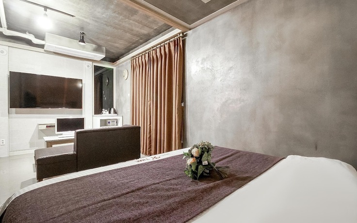 Imagen de la habitación del Hotel Yangsan Mulgeum Time. Foto 19