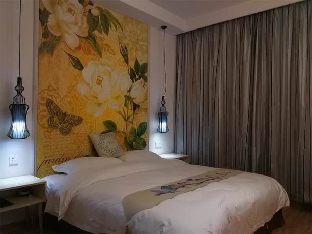 Imagen de la habitación del Hotel Yangshuo 9 Time. Foto 5
