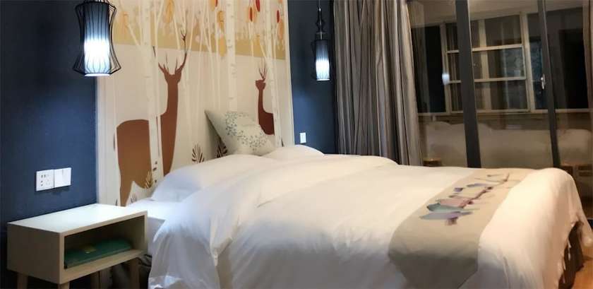 Imagen de la habitación del Hotel Yangshuo 9 Time. Foto 6