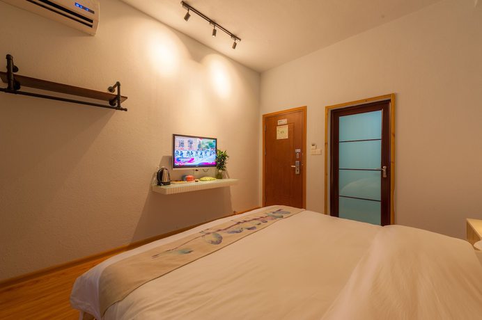 Imagen de la habitación del Hotel Yangshuo 9 Time. Foto 7