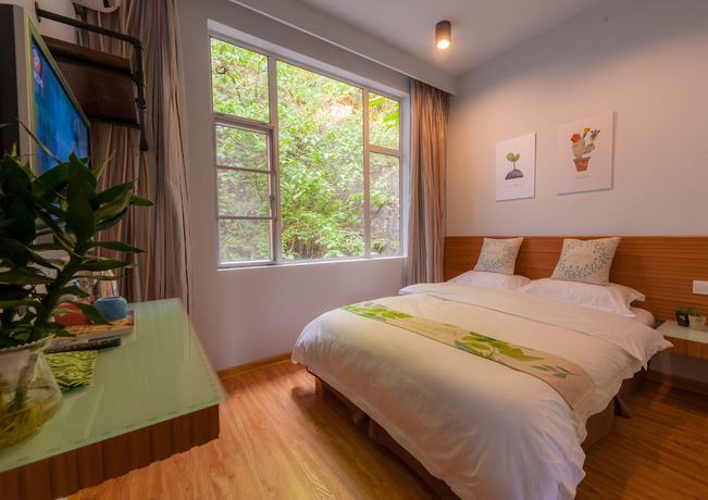 Imagen de la habitación del Hotel Yangshuo 9 Time. Foto 8