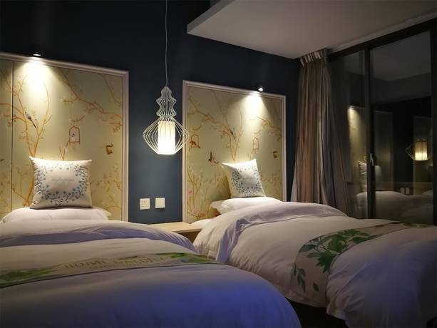 Imagen de la habitación del Hotel Yangshuo 9 Time. Foto 9