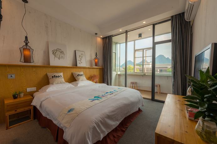 Imagen de la habitación del Hotel Yangshuo 9 Time. Foto 11