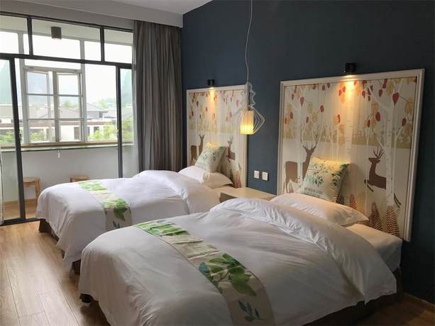 Imagen de la habitación del Hotel Yangshuo 9 Time. Foto 12