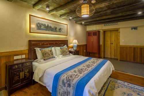 Imagen de la habitación del Hotel Yangshuo Ancient Garden Boutique. Foto 7