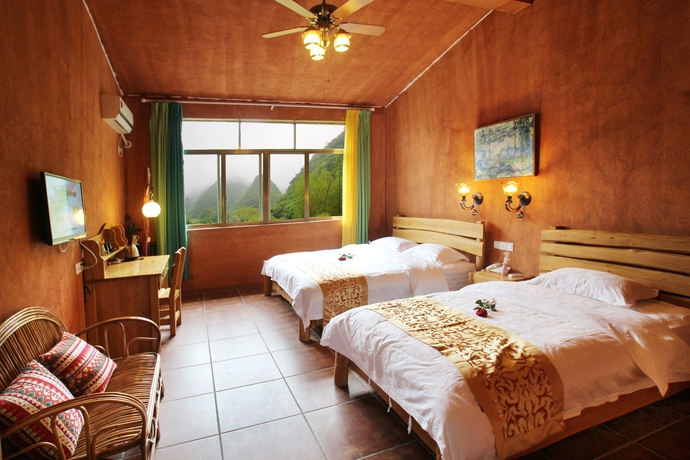 Imagen de la habitación del Hotel Yangshuo Eden Inn. Foto 13
