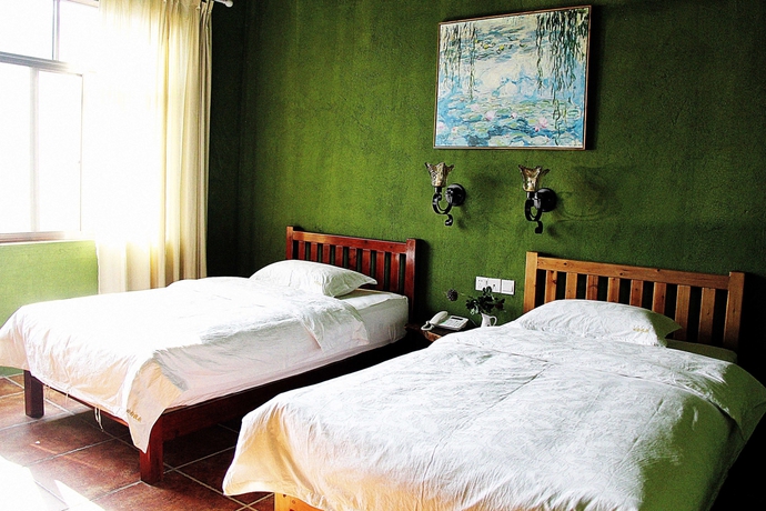 Imagen de la habitación del Hotel Yangshuo Eden Inn. Foto 15