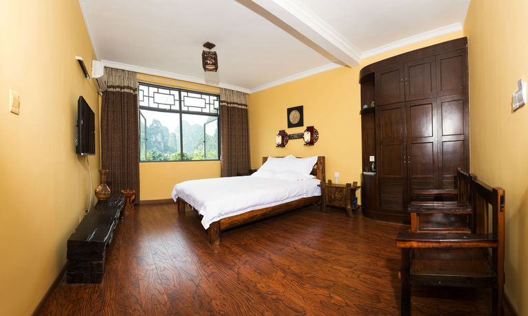 Imagen de la habitación del Hotel Yangshuo Hidden Dragon Villa. Foto 10