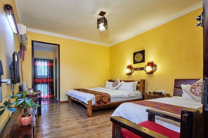 Imagen de la habitación del Hotel Yangshuo Hidden Dragon Villa. Foto 11