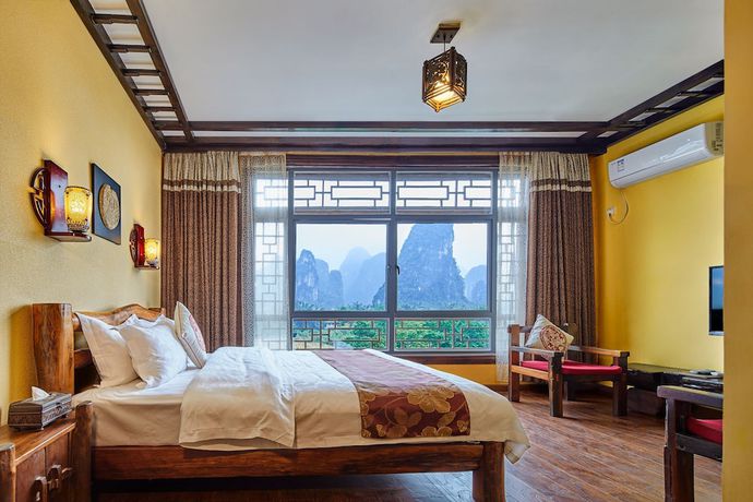 Imagen de la habitación del Hotel Yangshuo Hidden Dragon Villa. Foto 13