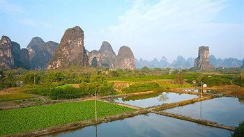 Imagen de los exteriores del Hotel Yangshuo Hidden Dragon Villa. Foto 17