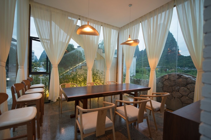 Imagen de los interiores del Hotel Yangshuo Lightheart Homestay. Foto 16