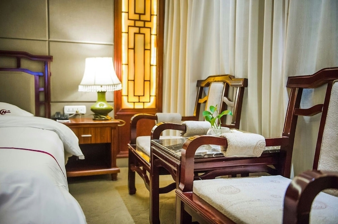 Imagen de la habitación del Hotel Yangshuo New Century Vip Building. Foto 2
