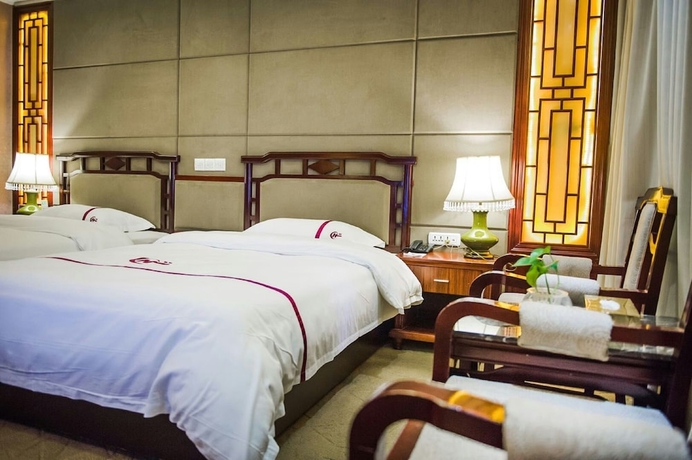 Imagen de la habitación del Hotel Yangshuo New Century Vip Building. Foto 3