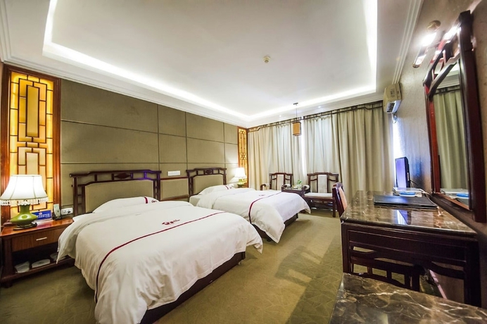 Imagen de la habitación del Hotel Yangshuo New Century Vip Building. Foto 5
