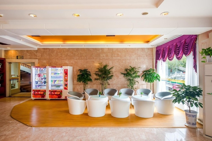 Imagen de los interiores del Hotel Yangshuo New Century Vip Building. Foto 18