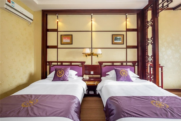 Imagen de la habitación del Hotel Yangshuo New Century Vip Building. Foto 7