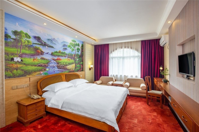 Imagen de la habitación del Hotel Yangshuo New Century Vip Building. Foto 9