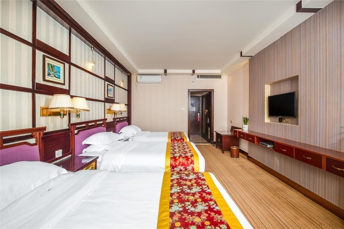 Imagen de la habitación del Hotel Yangshuo New Century Vip Building. Foto 10