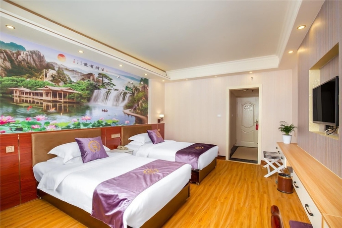 Imagen de la habitación del Hotel Yangshuo New Century Vip Building. Foto 11